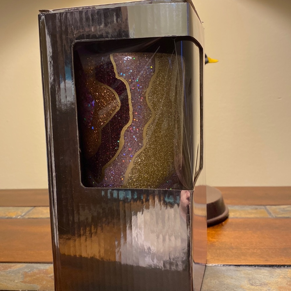 It is a handmade glitter tumbler